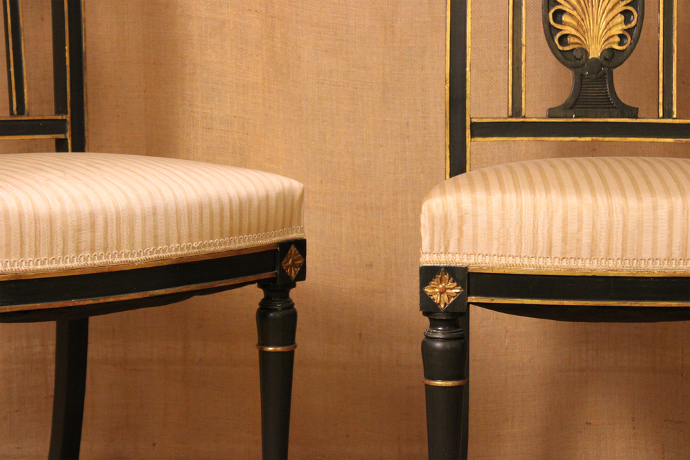 Pair of Directoire Style Ebonized and Parcel Gilt Side Chairs
