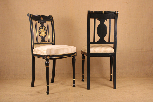 Pair of Directoire Style Ebonized and Parcel Gilt Side Chairs