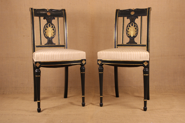 Pair of Directoire Style Ebonized and Parcel Gilt Side Chairs